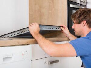 electrician installing cook top